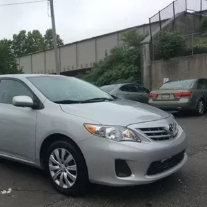 Серебряный цвет Toyota Corolla 2013 модельного