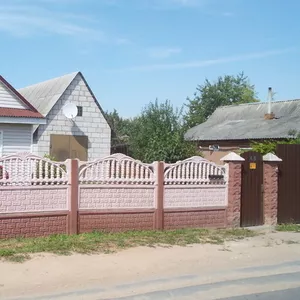 дом с гаражом в городе Слуцке